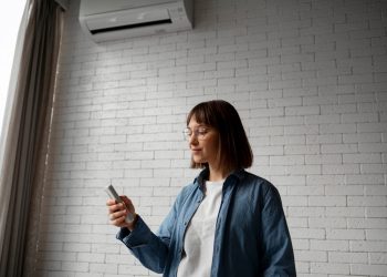 mulher no ar condicionado